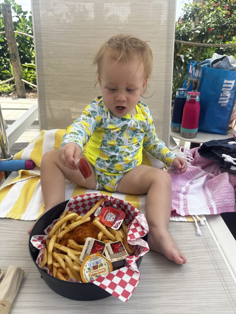 poolside lunch on lounge chair at best resort for kids in Palm Beach 