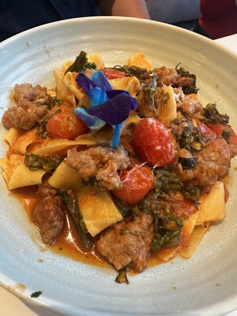 waterfront dining at a Palm Beach resort- sausage pappardelle pasta 