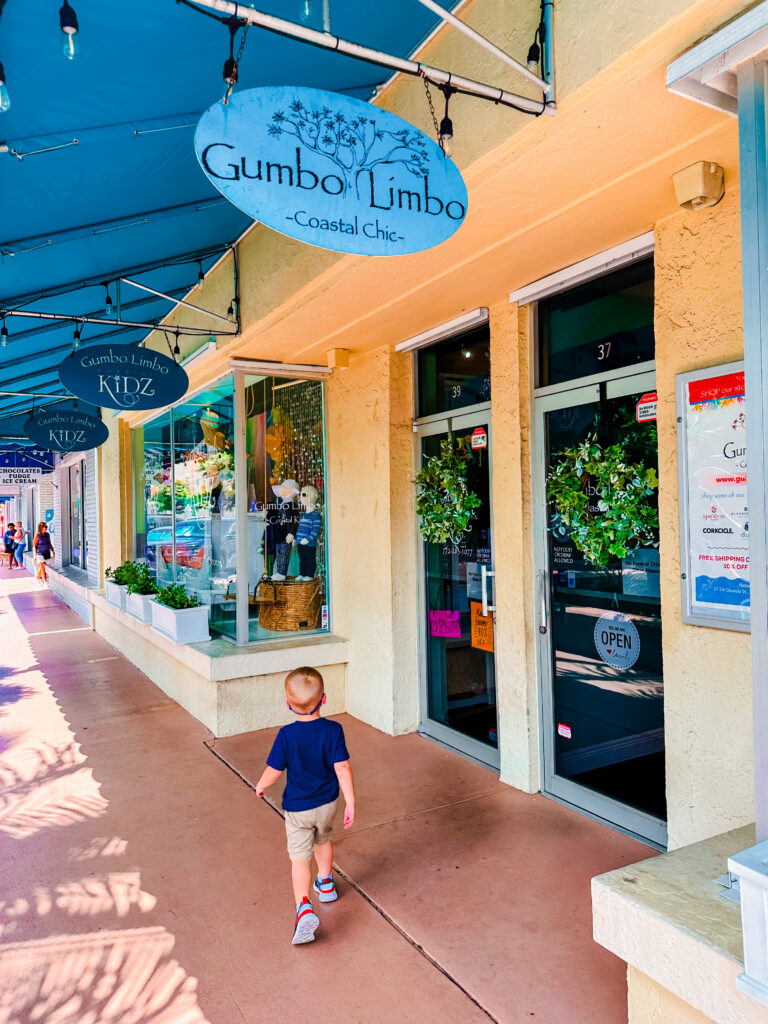 toy store and book store for kids in Stuart: Gumbo Limbo-view of child walking up to store 